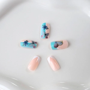 Classic French blue butterfly and flower press-on nails with white V-shaped tips