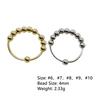 Adjustable stainless steel anti-anxiety spinner ring with movable beads in gold and silver