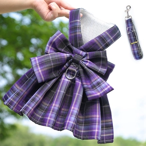 Detail of purple plaid pet harness dress with breathable mesh lining and metal D-ring