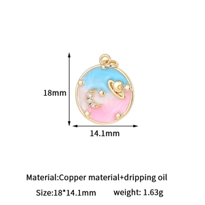Vintage 14k gold celestial pendant with moon, star, and saturn motifs in blue pink enamel