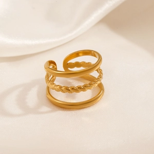 Three-layer 18K gold plated stainless steel open ring on elegant white silk fabric