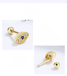 Detailed view of S925 sterling silver evil eye stud earrings with blue stone inlay