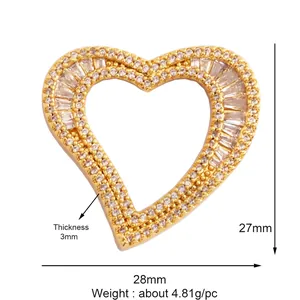 Detail view of 28mm golden heart charm with cubic zirconia stones and product dimensions