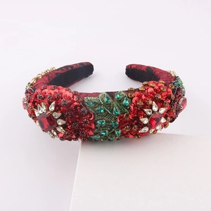 Luxurious padded headband with red gems and green bead leaves for party fashion style