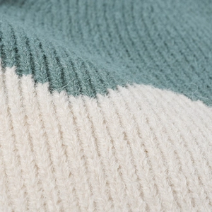 Winter rib knit beanie in grey-green and off-white color block showing soft texture