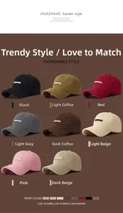 Detail of multi-color distressed baseball caps with SUNSHINE embroidery patches
