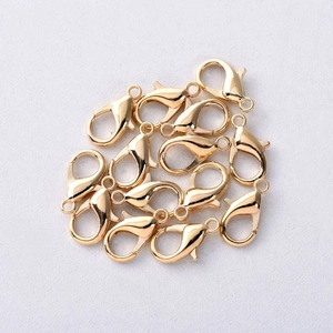 Golden alloy lobster claw clasps for DIY jewelry making and necklace connector repairs