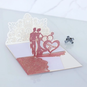 Detailed 3D pop-up wedding card with glitter hollow design and Mr & Mrs heart silhouette