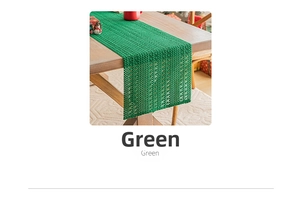 Close-up of green crochet table runner with openwork mesh texture for Christmas decor