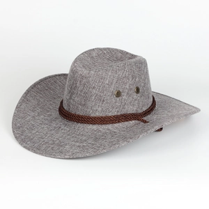 Dettaglio della trama del tessuto e corda marrone decorativa su un cappello da cowboy