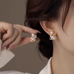 Elegant silver needle rocking horse pearl earrings with pink and blue enamel detailing