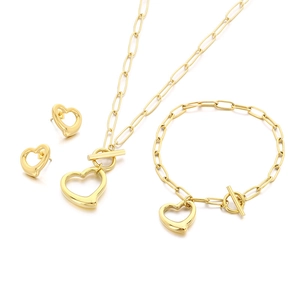 Three-piece gold titanium steel jewelry set with hollow heart pendants and OT toggle clasp