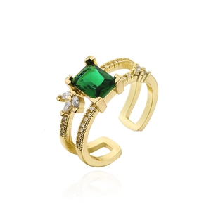 Minimalist 18K gold plated ring with emerald green zircon and micro paved crystals