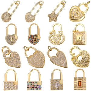 Collection of gold micro-pave zircon charms featuring heart locks and star shapes