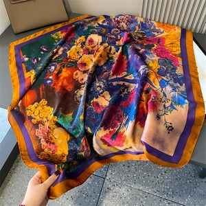 Detailed view of large square silk scarf featuring vintage floral and grape oil painting prints