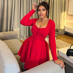 Elegant red long sleeve A-line dress featuring a square neckline and front bow detail