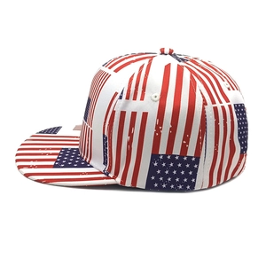 Detail of a six-panel snapback hat featuring a repetitive American flag pattern print