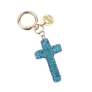 Golden cross keychain with light blue rhinestones on leather cord for car keys