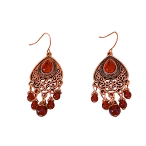Vintage bronze teardrop earrings with bohemian red beads and hollow carved floral patterns