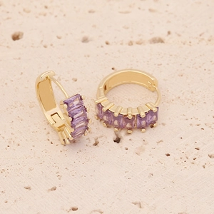 Detail shot of Huggie Style earrings featuring purple rectangular cubic zirconia stones