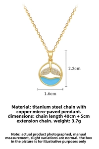 Detailed view of gold mermaid tail necklace showing blue enamel finish and dimensions