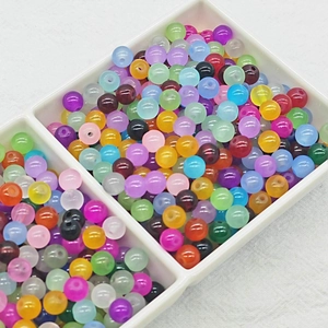 Detail shot of colorful 6mm frosted glass round beads for DIY jewelry making