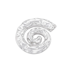Macro shot of silver spiral shell pendant with hammered metal texture detail