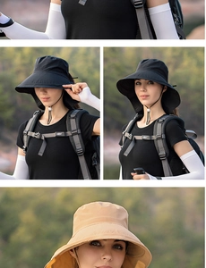 Detail of wide-brim outdoor sun hats in black and khaki with adjustable wind strings
