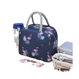 Insulated lunch bag with pink flamingo patterns and top handle for portable food storage