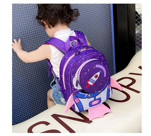 Detail of toddler rocket backpack showing purple space theme and safety leash attachment