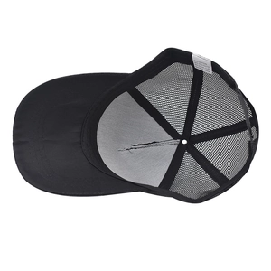Detail of baseball cap interior showing 65% cotton mesh and quality stitching