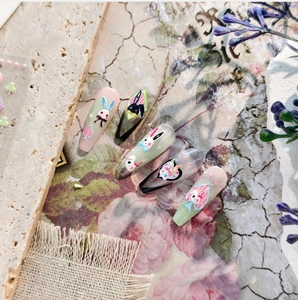 Detail of Alice-themed rabbit 3D embossed nail stickers with heart and poker patterns