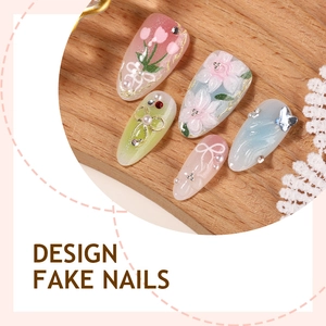 Short 3D floral press-on nails with handmade flower, bow, and rhinestone designs