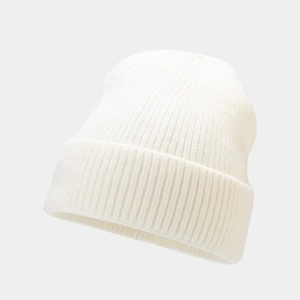 Close-up of white ribbed knit beanie with wide folded cuff for winter outdoor warmth