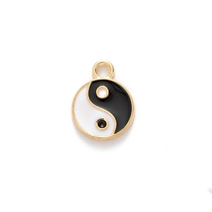 Detailed view of Yin Yang Tai Chi pendant with black and white enamel and golden metal rim