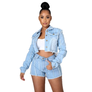 Slim fit light blue denim two-piece set featuring long sleeve jacket and frayed hem shorts