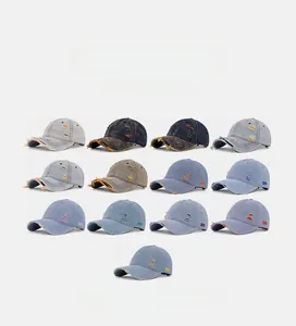 Detailed grid of vintage distressed denim baseball caps in various washed colors