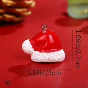 Macro view of a resin Christmas hat charm showing dimensions and holiday details