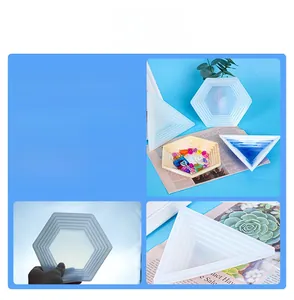 Close-up of food-grade silicone molds featuring nested hexagonal and triangular designs