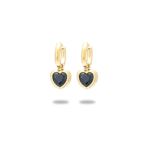 Macro shot of gold plated heart earrings with black gems and sparkling diamond detail