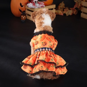 Detailed back view of a Halloween dog dress with pumpkin prints and black lace trim