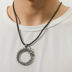 Vintage Viking dragon pendant necklace with silver finish on black braided leather cord