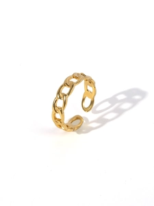 Detail of 18k gold plated stainless steel Cuban chain link open ring on white backdrop
