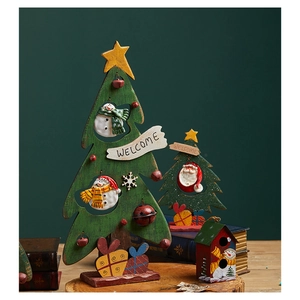 Hand-painted vintage green wooden Christmas tree set with snowman and star ornaments