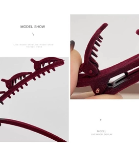 Detail of wine red flocked double-layer hair clip with multiple teeth for layered styling