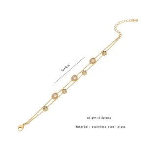 Détails du bracelet double couche en acier avec étoile et breloque en verre