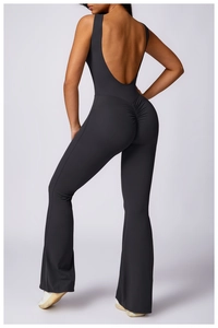 Detail of the backless design and scrunch butt feature on black yoga jumpsuit