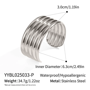 Detailed view of silver stainless steel cuff bracelet showing 3.0cm width and wavy texture