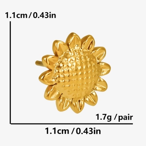 Macro shot of gold sunflower stud earrings with detailed 1.1cm petals and textured center