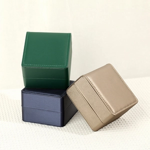 Three premium PU leather watch storage gift boxes in green, dark blue, and beige colors